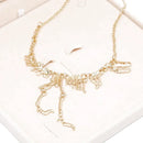 collier pendentif dinosaure or
