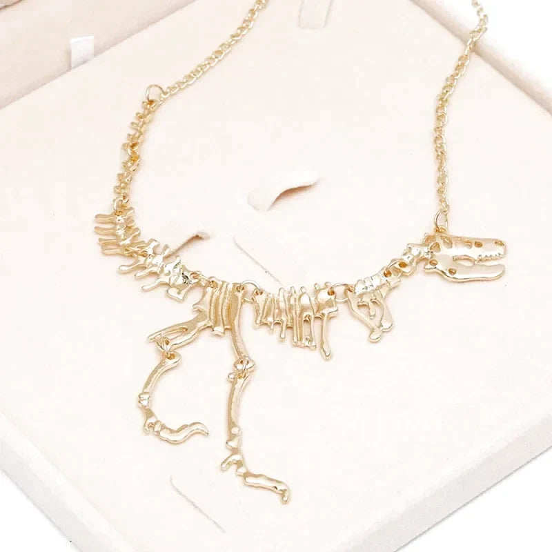 collier pendentif dinosaure or