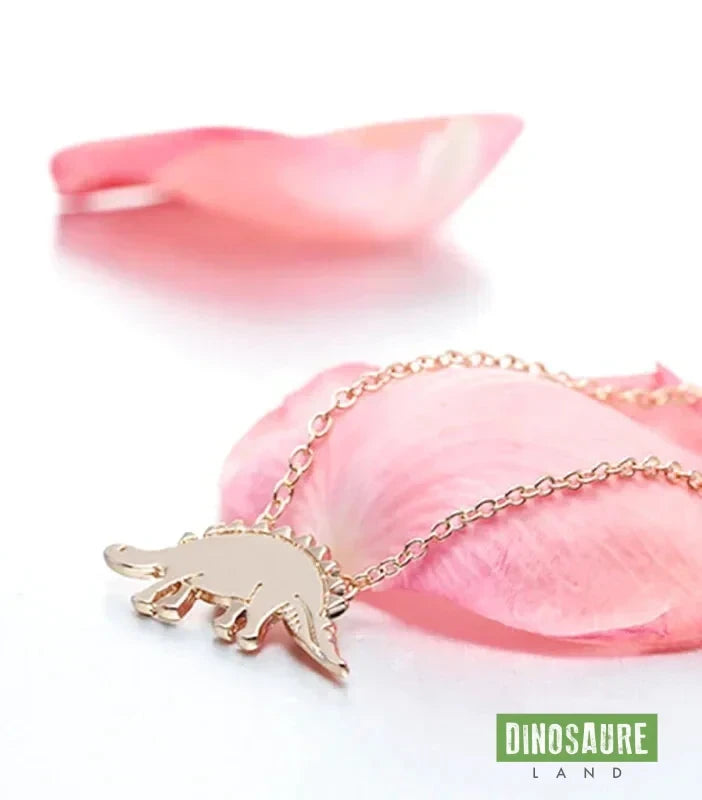 collier pendentif dinosaure stegosaure or