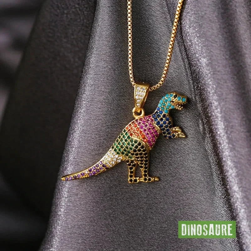 collier pendentif dinosaure cristal or