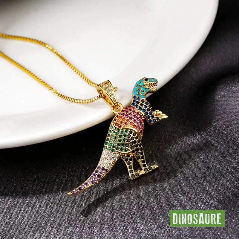 collier pendentif dinosaure cristal or